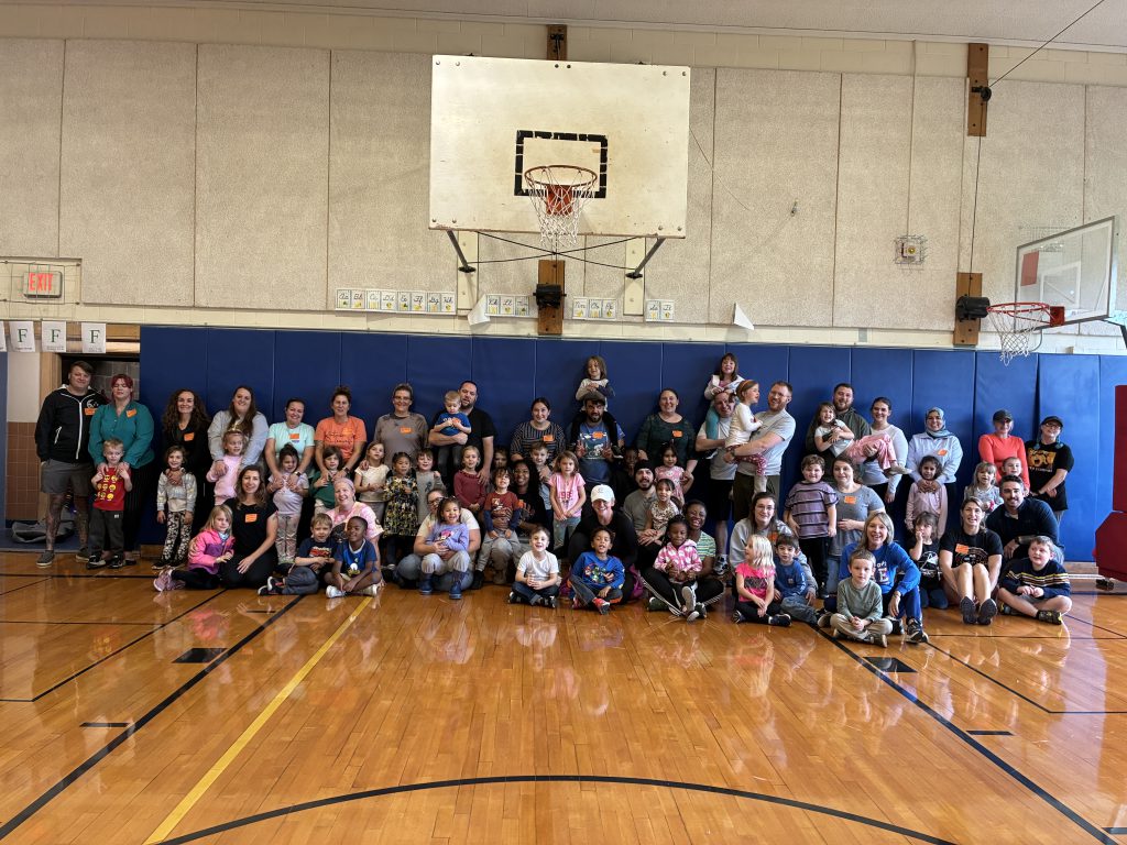 Families join their students in physical education class for an annual tradition.
