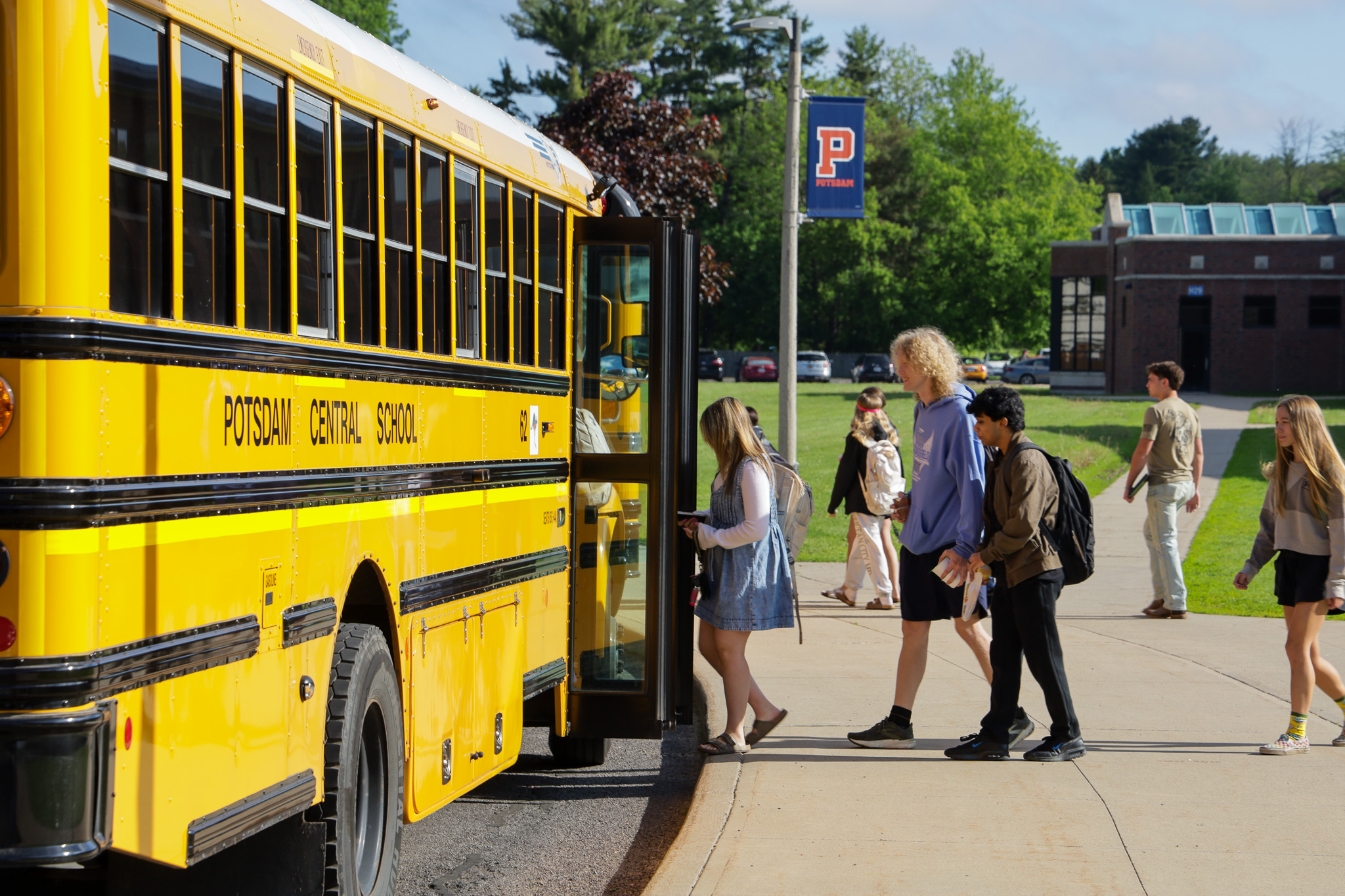 High School students get on bus 