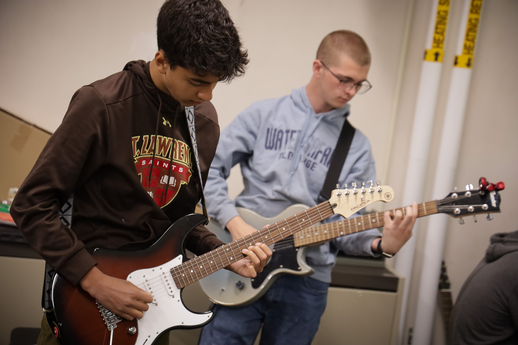 Guitar students practice 
