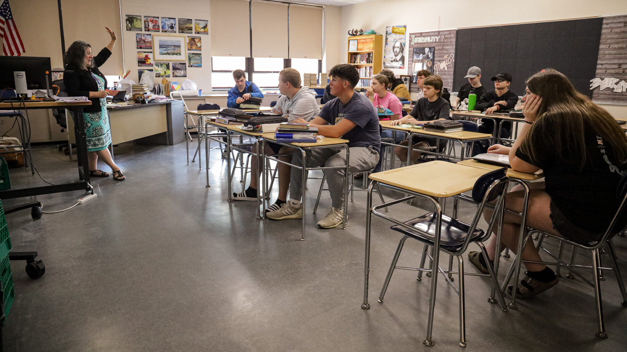 High school class listens to teacher during class