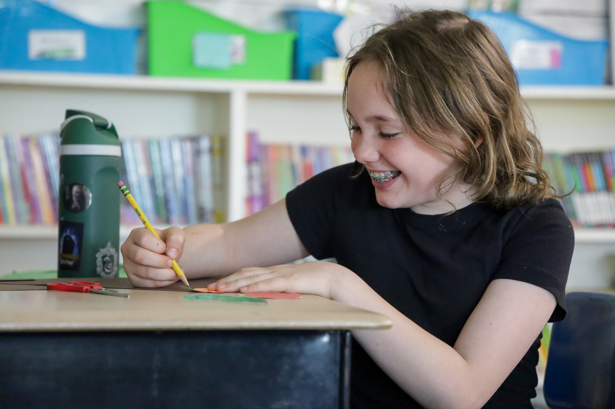 Middle School girl works on assignment 
